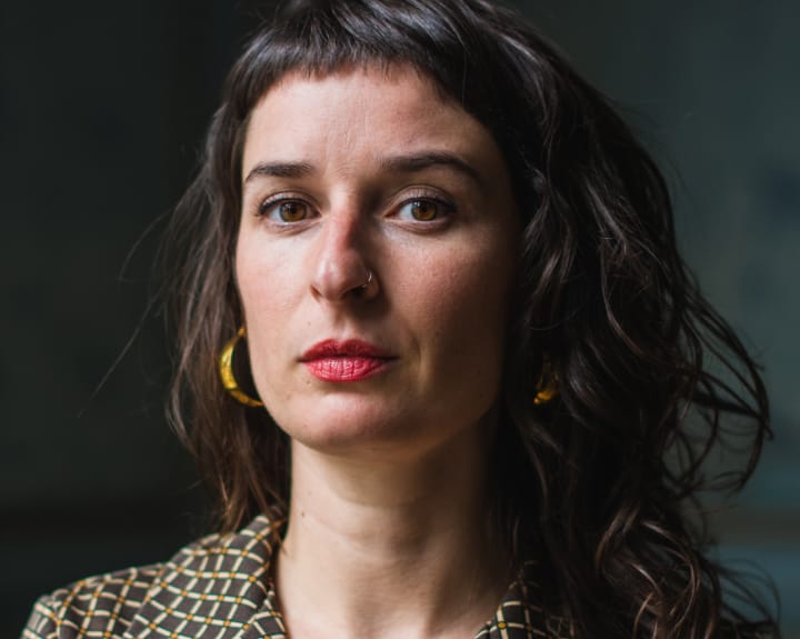 woman with bangs and red lipstick